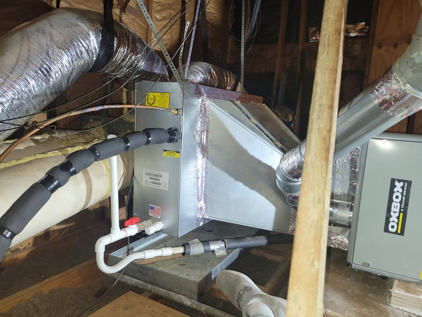 New evaporator coil and furnace installed in an attic