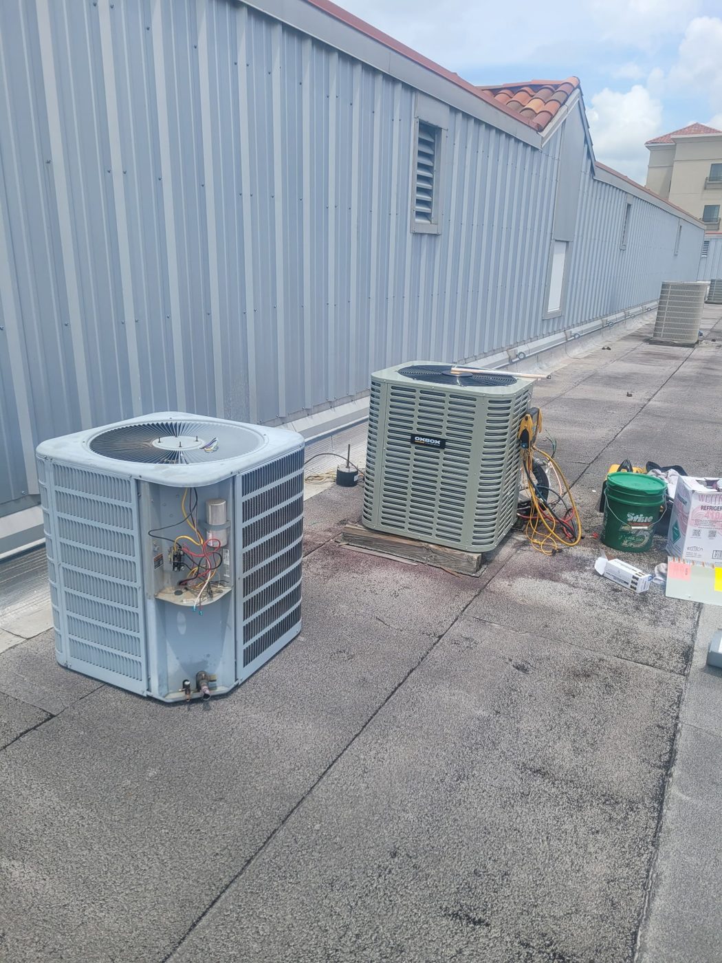 Rooftop condenser change-out in progress