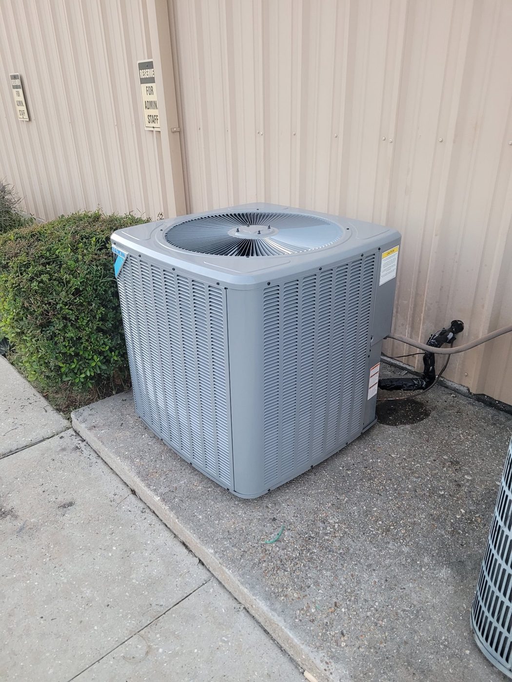 Large Daikin condenser installed at a commercial building